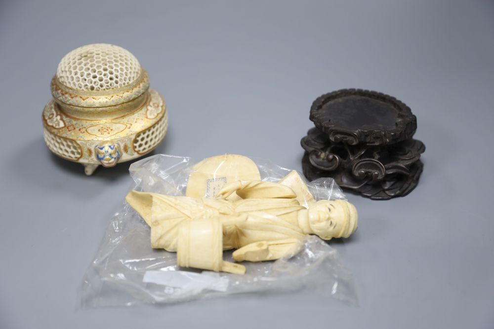 A Meiji period Satsuma reticulated pot pourri bowl and cover, 9cm and an ivory okimono (a.f.)